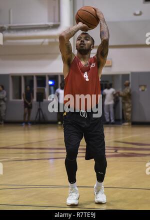 Lonnie Perrin, a member of the 1st Special Operations Medical Group basketball team, shoots a free throw during the intramural basketball championship at the Aderholt Fitness Center on Hurlburt Field, Fla., April 6, 2017. For eight weeks, 12 teams competing through a single-elimination tournament to qualify for the championship game. Stock Photo