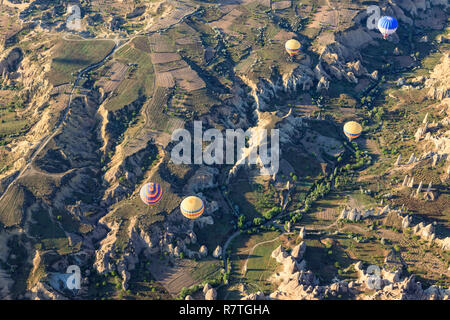 Aerial view of hot air ballons over Love Valley near Goreme and Nevsehir in the center of Cappadocia, Turkey. This shot taken from a balloon. Stock Photo