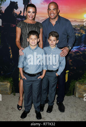 HOLLYWOOD, LOS ANGELES, CA, USA - NOVEMBER 28: Amber Nichole Miller, Tito Ortiz at the Los Angeles Premiere Of Netflix's 'Mowgli: Legend Of The Jungle' held at ArcLight Cinema Hollywood on November 28, 2018 in Hollywood, Los Angeles, California, United States. (Photo by Xavier Collin/Image Press Agency) Stock Photo