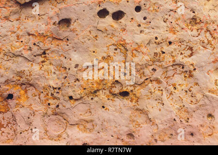 Rock layers - a colorful formations of rocks stacked over the hundreds years. Interesting background with fascinating texture. Stock Photo