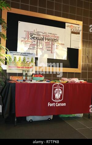 April is National Sexually Transmitted Infection Awareness Month. Evans Army Community Hospital, Fort Carson, Co., Preventive Medicine’s Communicable Disease Clinic kicked off the campaign with various events and displays such as this table. The table contained information pamphlets, male and female condoms, and contact information to receive free, confidential STI testing. Stock Photo