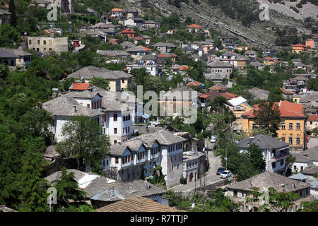 View of Gjirokastra with typical stone covered roofs, UNESCO World Heritage Site, Gjirokaster, Gjirokastër County, Albania Stock Photo
