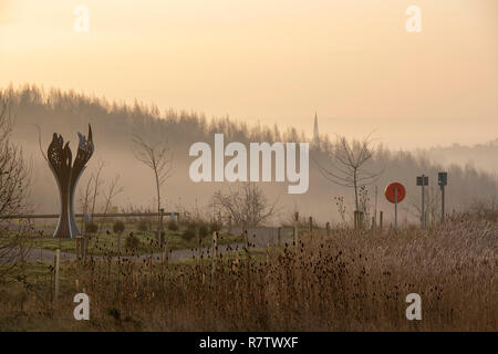 Mining Memorial Flame on a misty morning at Gedling Country Park in Nottingham, Nottinghamshire England UK Stock Photo