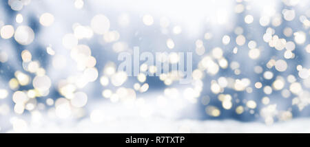festive snowy winter christmas background with circular bokeh lights Stock Photo