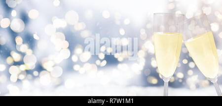 champagne glasses against winter background Stock Photo