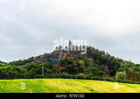 China Shanghai Botanical Garden with Pagoda on Hill Surrounded by Forest Trees Stock Photo