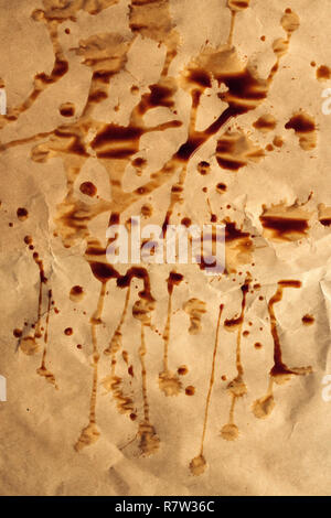 Coffee drips, stains and splashes on brown paper, top view Stock Photo