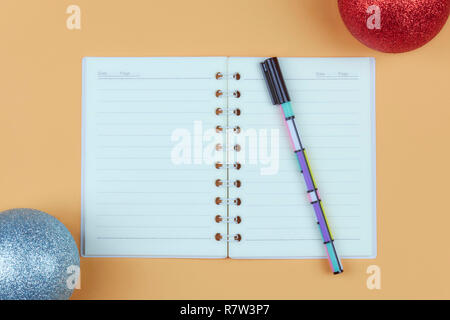 Notepad for text on pink table with copy space. Education and office concept Stock Photo