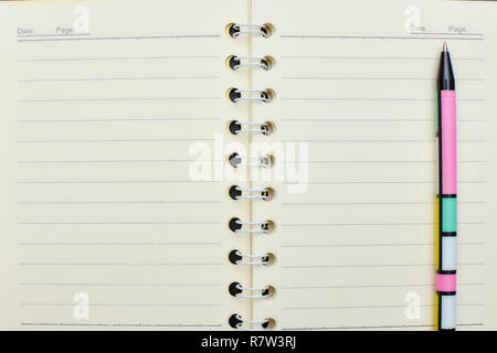Laptop, pen, close-up. view from above. white sheet of paper Stock Photo