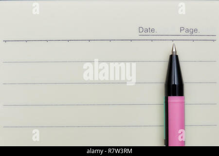 Laptop, pen, close-up. view from above. white sheet of paper Stock Photo