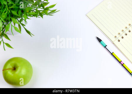 concept of recording your daily affairs. Notepad on a white background. Copy space layout Stock Photo