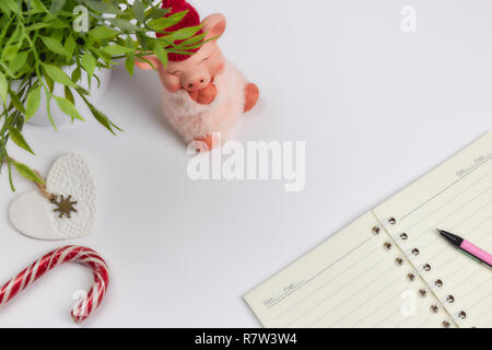 concept of recording your daily affairs. Notepad on a white background. Copy space layout Stock Photo