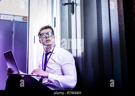 Nice professional programmer working on the laptop Stock Photo