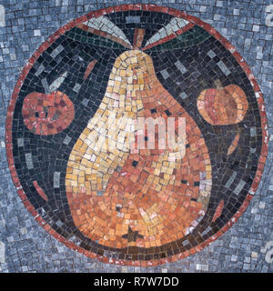 Circular Mosaic with a design at the center. Misaic Floor. Mosaic Design. Stock Photo