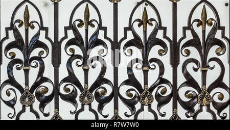 Ornate Iron Fence. Star Design. Lattice Fence. Black Iron Fence. Iron Railing. Black And Gold. Stock Photo
