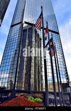Office tower block with reflection of adjacent office block in its windows Stock Photo