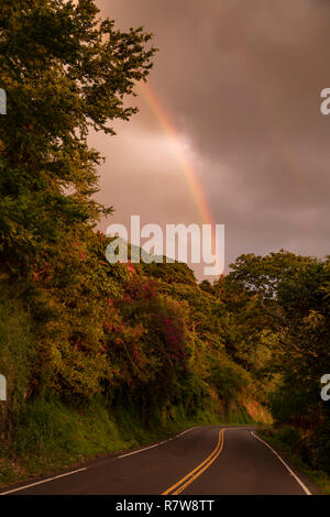 Captain Cook, Hawaii - A rainbow over Highway 160. Stock Photo