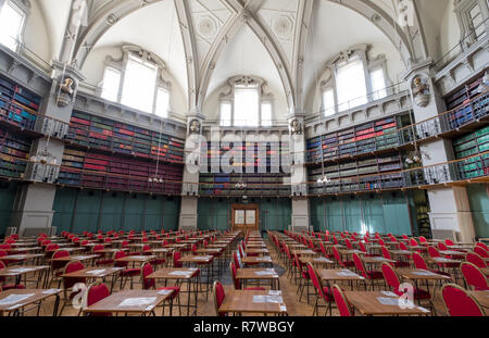 Interior of the historic Octagon Library at Queen Mary, University of London, Mile End UK. Colourful leather bound books line the shelves. Stock Photo