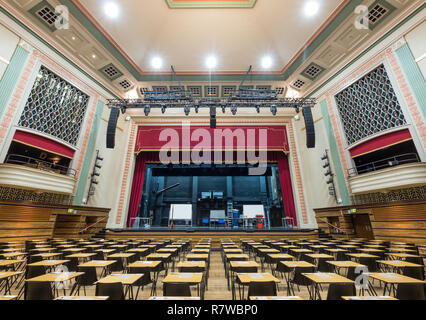 Interior of the Great Hall, Queen Mary, University of London. The Victorian entertainment hall was renovated in art deco style after a fire in 1931. Stock Photo