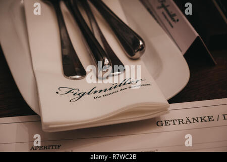 Vienna, Austria - Novermber 24, 2018: Cutlery on the table in Figlmuller on Wollzeile restaurant in Vienna. Opened in 1905, it is often referred to as Stock Photo