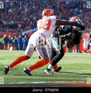 Cleveland, Ohio, USA. 9th Dec, 2018. Carolina Panthers tight end Ian Thomas  (80) tackled short of the goal line by Cleveland Browns cornerback Terrance  Mitchell (39) at the NFL football game between