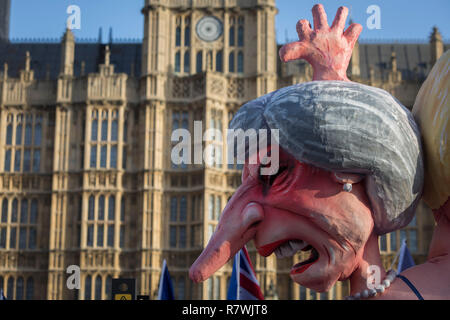 London, UK 11th December 2018: As Prime Minister Theresa May tours European capitals hoping to persuade foreign leaders to accept a new Brexit deal (following her cancellation of a Parliamentary vote), pro-EU Remainers protest with satirical figure of Theresa May opposite the Houses of Parliament, on 11th December 2018, in London, England. Photo by Richard Baker / Alamy Live News Stock Photo