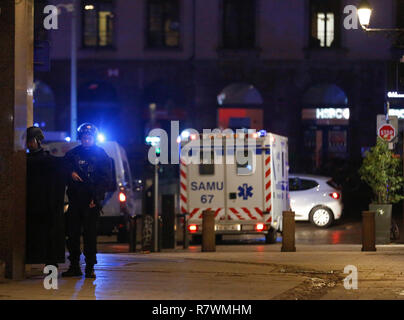 Strasbourg, France. 11th Dec, 2018. Policemen stand guard in the center of Strasbourg, France, on Dec. 11, 2018. At least two people were killed and eleven wounded in a shooting near a Christmas market in the French city of Strasbourg on Tuesday evening, local media reported. Credit: Ye Pingfan/Xinhua/Alamy Live News Stock Photo