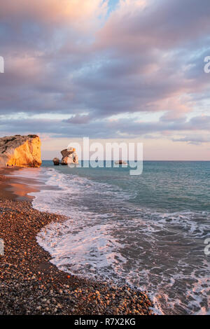 Beautiful afternoon view of the beach around Petra tou Romiou, in Paphos, Cyprus. It is considered to be Aphrodite's birthplace in Greek mythology. Stock Photo