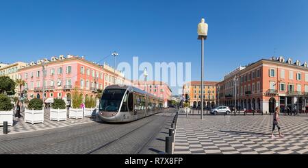 France, Alpes Maritimes, Nice, tramway on Place Masséna and statues of the work called '' Conversation in Nice '' by Catalan artist Jaume Plensa Stock Photo
