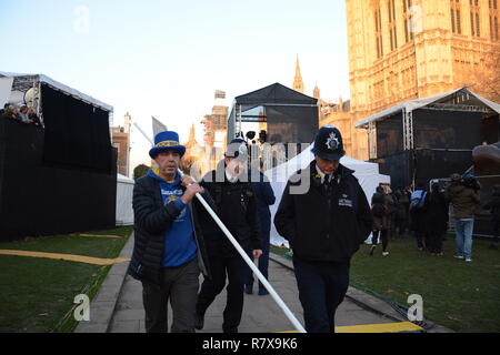 Steve Bray is escorted from College Green on the day of the Meaningful Vote (that never took place). 11th December 2018. Stock Photo