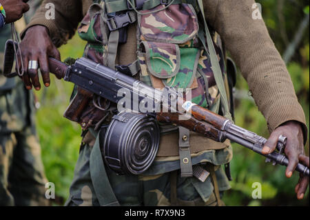 DRC national army soldiers, armed with Kalashnikov AK-47 rifles in Virunga National Park, North Kivu, Democratic Republic of Congo Stock Photo