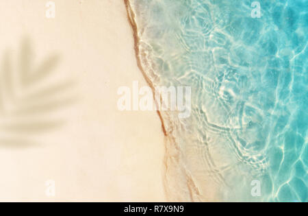 Soft beautiful ocean wave on sandy beach. Summer background. Stock Photo