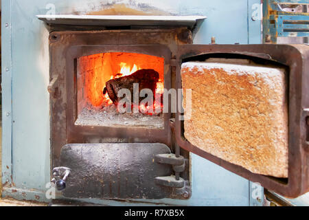 Wood burns in oven Stock Photo