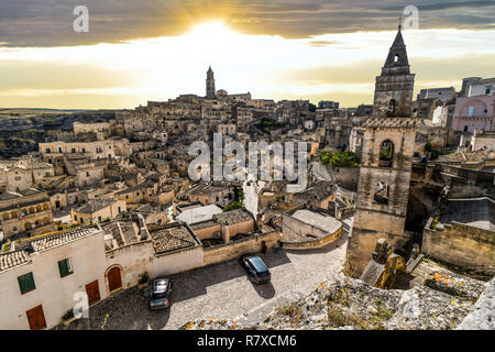 View of sassi, abandoned homes, canyon and tourist center of the ancient prehistoric city of Matera, Italy, from the Matera Cathedral Stock Photo
