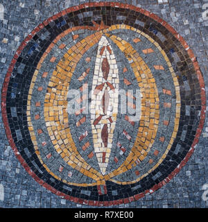 Circular Mosaic with a design at the center. Misaic Floor. Mosaic Design. Stock Photo