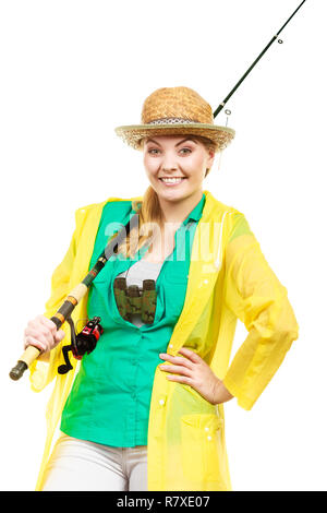 Fishery, spinning equipment, angling sport and activity concept. Woman with fishing rod. Stock Photo