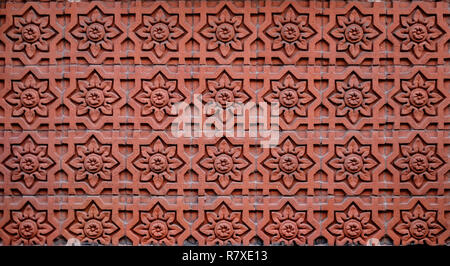 Flower Design Stone Carving. Stone Design. Decorative Stone Facade Stock Photo