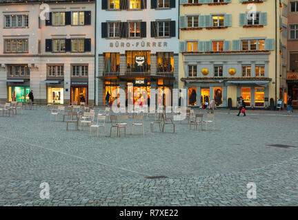 Zurich, Switzerland - December 11, 2018: Munsterhof square in the city of Zurich decorated for Christmas at dusk. Munsterhof is a town square in the h Stock Photo