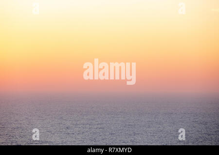 Beautiful morning sunset sky with soft blur pastels gradient background . Stock Photo