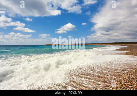 Storming sea and wide-spreading waves, Cyprus coastline. Stock Photo