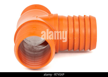 Tee made of plastic for the installation of water pipes, for connection of branches in the water supply system,  isolated on white background Stock Photo