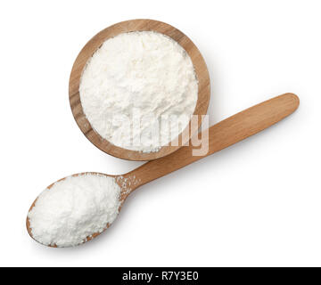 Top view of wooden spoon and bowl full of corn starch isolated on white Stock Photo