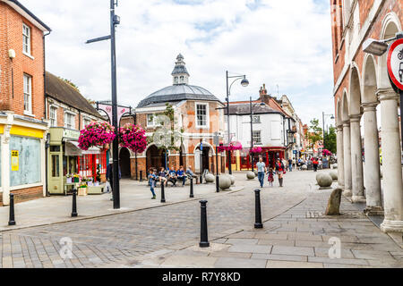 High Wycombe, England - 12th August 2015: View down church street towards HIgh street. The Cornmarket is on the left and the guildhall on the right. Stock Photo