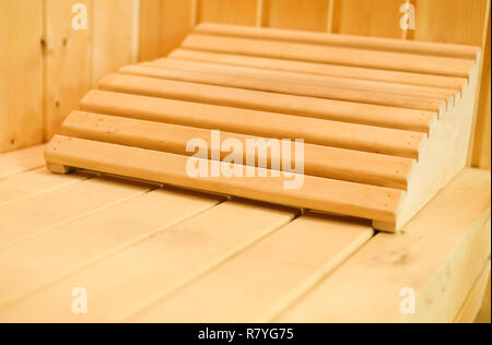 Interior of traditional classic wooden finnish sauna with headrest Stock Photo