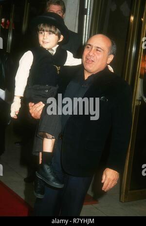 WESTWOOD, CA - MARCH 30: Actors Miko Hughes and Danny DeVito attend the 'Jack the Bear' Premiere on March 30, 1993 at the Mann National Theatre in Westwood, California. Photo by Barry King/Alamy Stock Photo Stock Photo