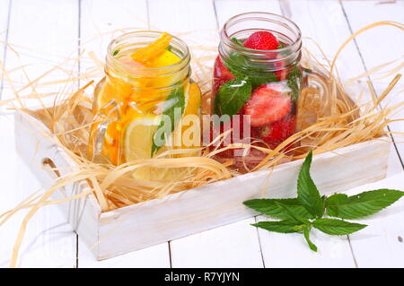 Fruit smoothies on a white wooden table Stock Photo