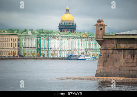 St. Petersburg, Russia – October 21, 2018: State Hermitage Museum viewed from Neva River front with St. Isaac’s Cathedral in the background. Stock Photo