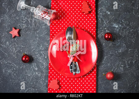 Beautiful Christmas table setting with decorations. Preparation for christmas dinner. Top view Stock Photo