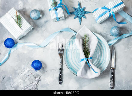 Beautiful Christmas table setting with decorations. Preparation for christmas dinner. Top view Stock Photo