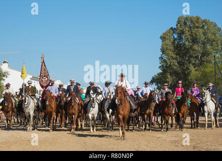 Dressed up horsemen and horsewomen during the annual Pentecost pilgrimage of El Rocio. Huelva province, Andalusia, Spain. Stock Photo